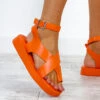 At A Crossroads - Orange Sandals