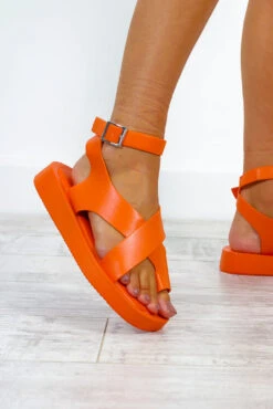 At A Crossroads - Orange Sandals